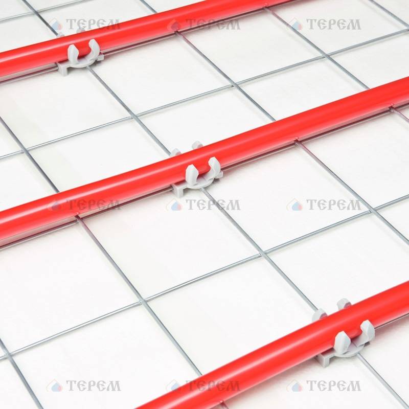 Крепление сетки теплого пола. Сетка монтажная для теплого пола 100 на 100. Крепление теплого пола к сетке. Арматурный хомут 150*150. Крепление сетки теплого пола.